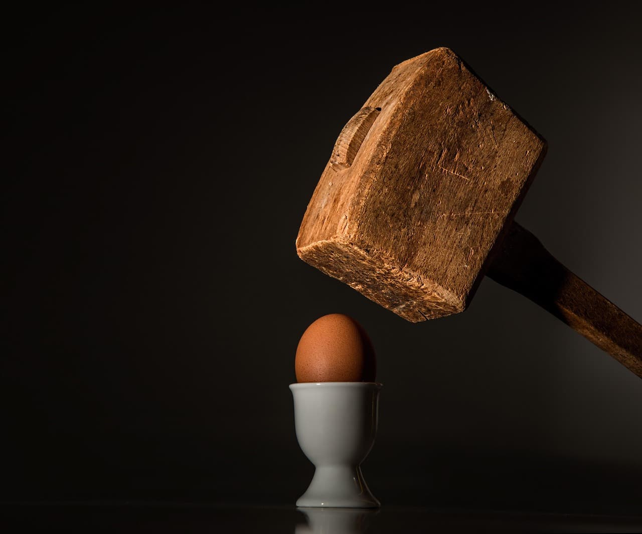 egg, hammer, hit, beat, fragile, vulnerable, threaten, fear, intimidate, force, scare, frighten, coerce, aggression, power, attack, conflict, brutal, coercion, cruel, pounding, anger, smash, blow, sha